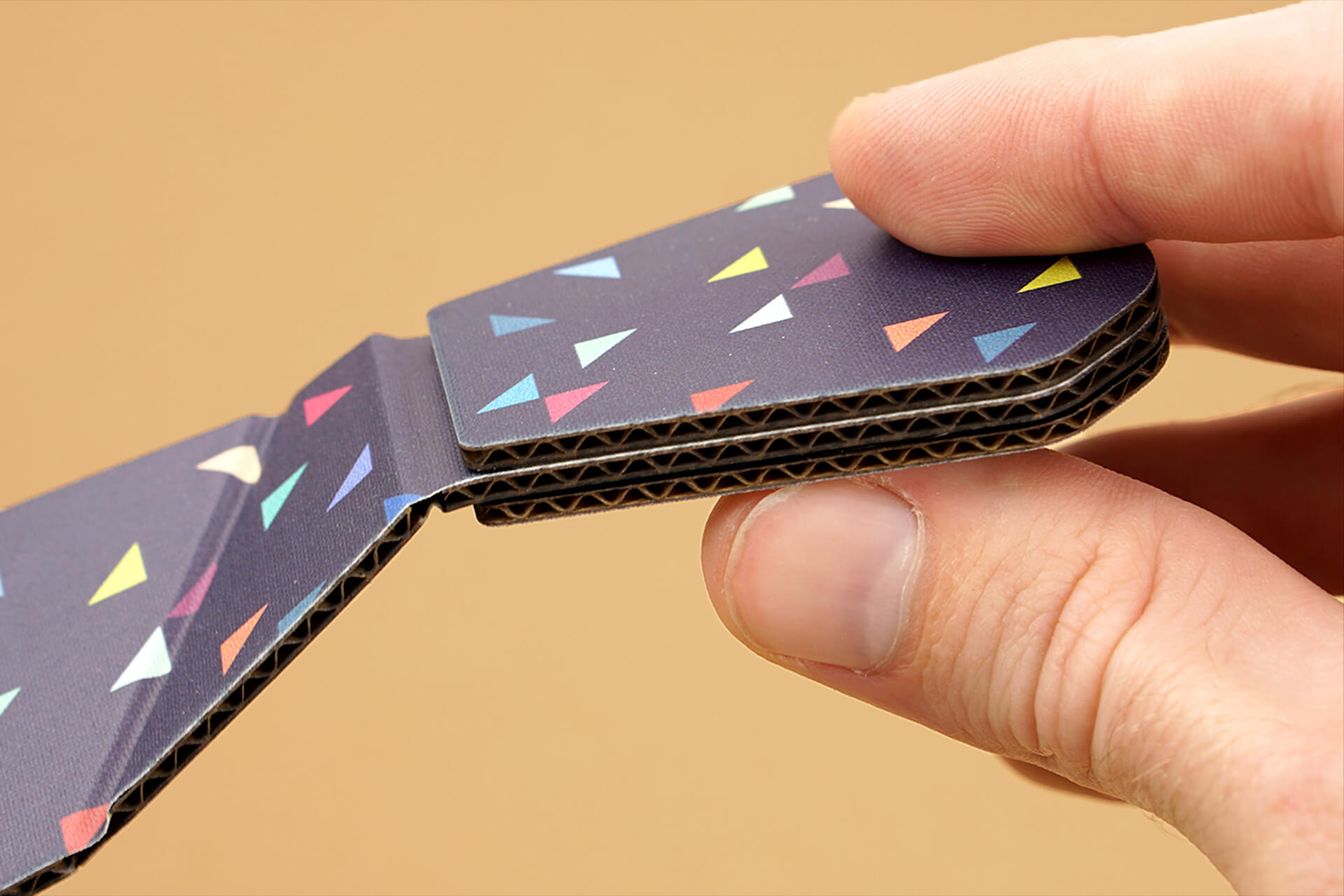 A close-up shot showing the cardboard corrugation of the tie