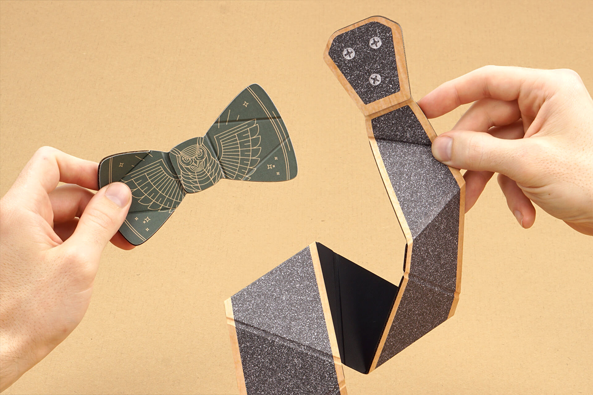 Showing the cardboard bow tie and neck tie flexing