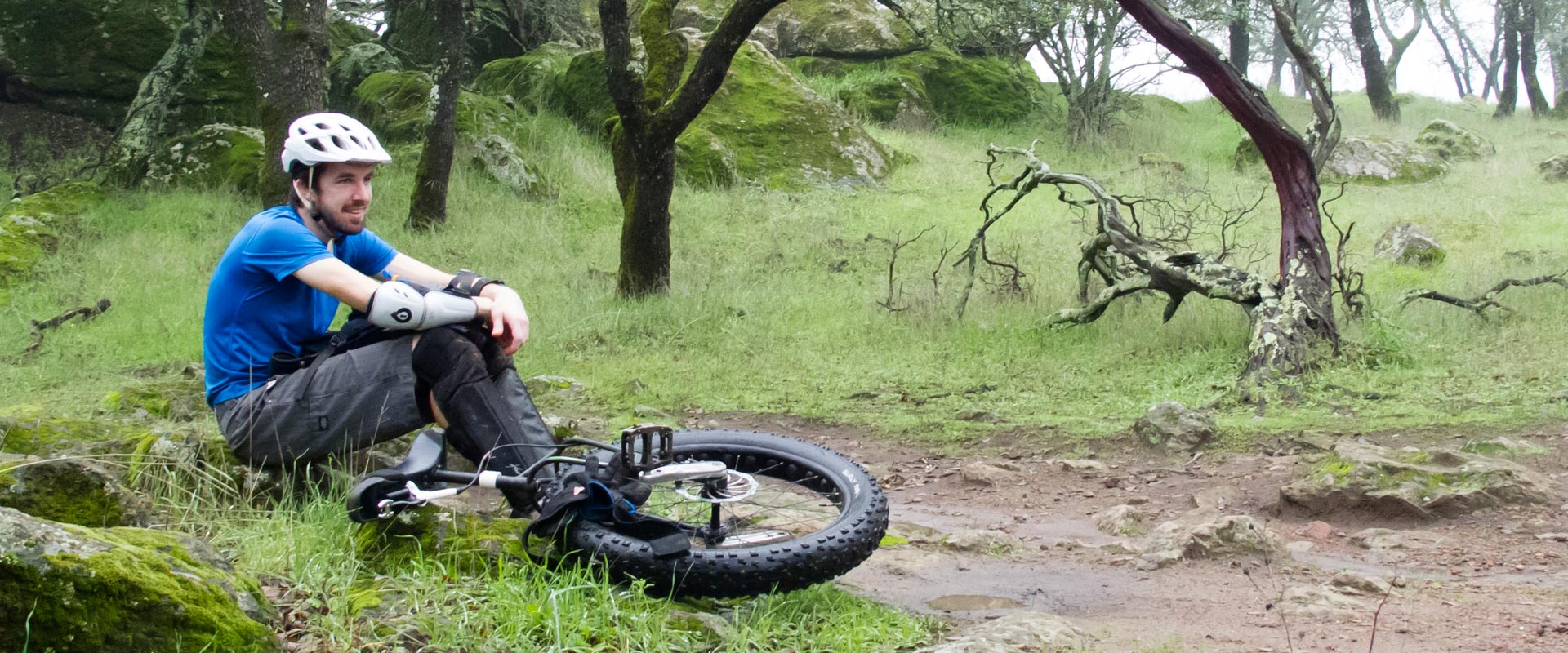 Josh sitting casually while mountain unicycling