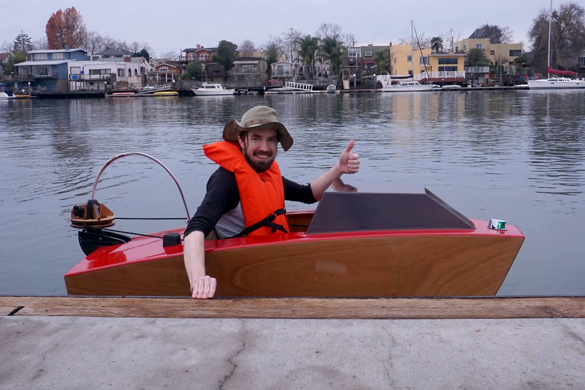 First launch of the mini electric boat, sitting by the dock