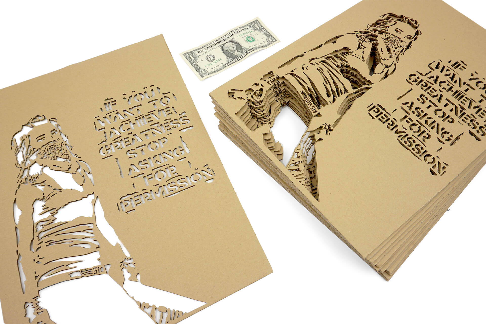 Cardboard stencils cut for inserts into a Banksy calendar