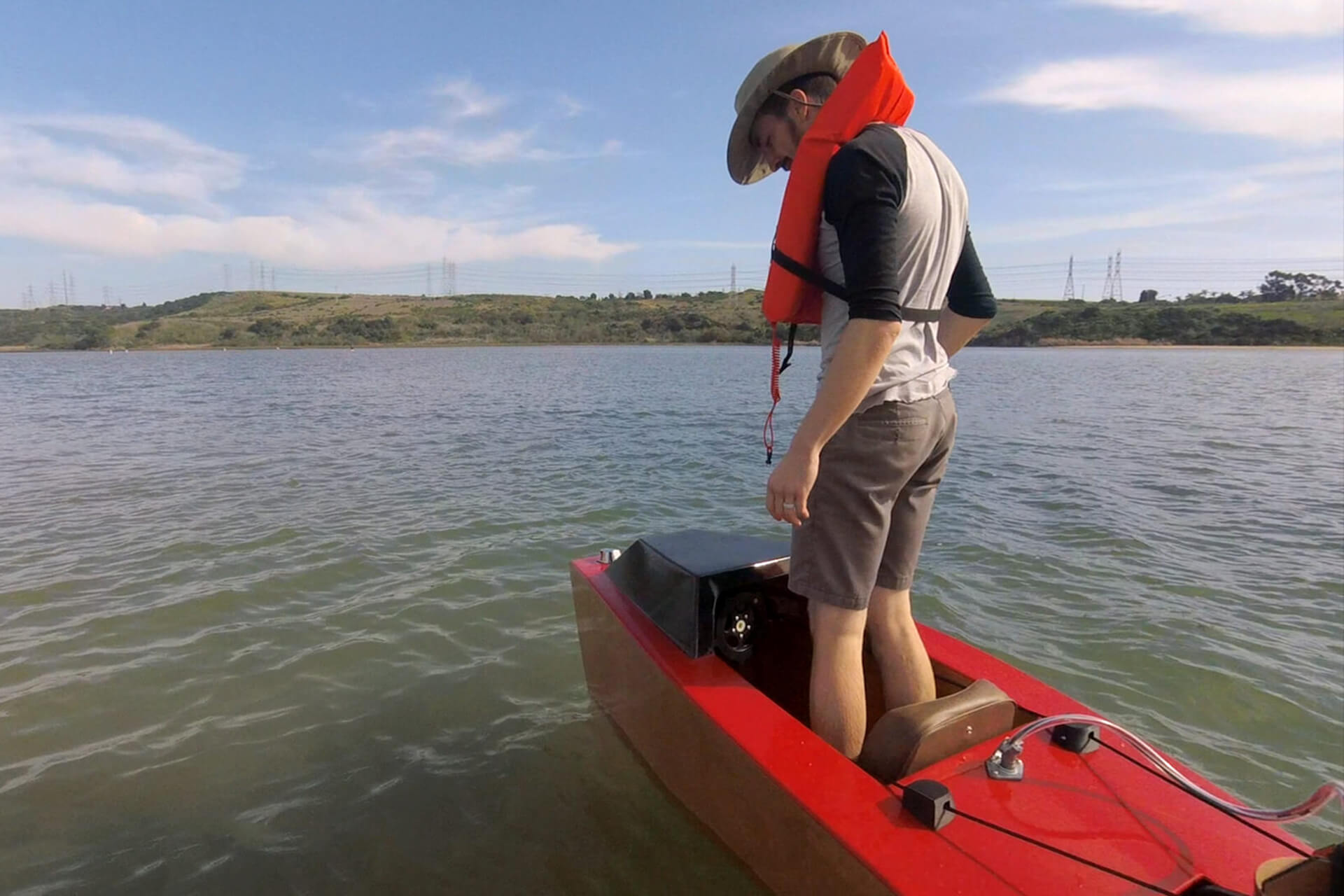 Balancing while standing in the mini boat